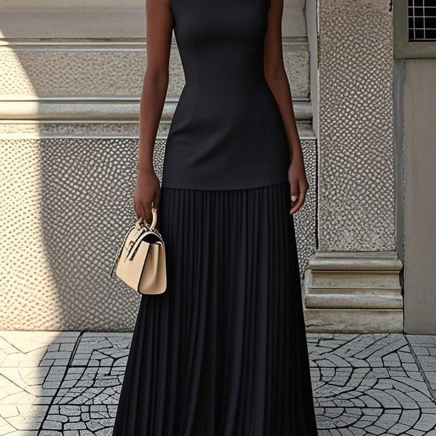 Vivienne | Sleeveless pleated maxi gown with flowing movement