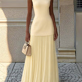 Vivienne | Sleeveless pleated maxi gown with flowing movement