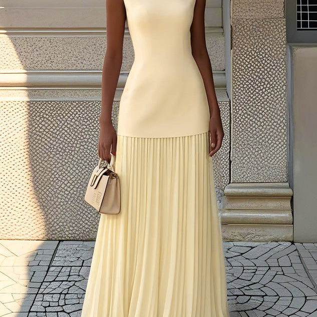 Vivienne | Sleeveless pleated maxi gown with flowing movement