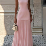 Vivienne | Sleeveless pleated maxi gown with flowing movement
