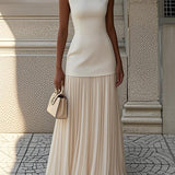 Vivienne | Sleeveless pleated maxi gown with flowing movement